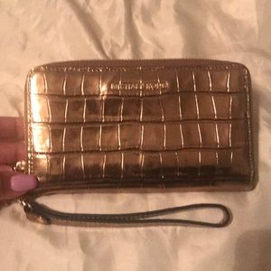 Gold Michael Kors wristlet/wallet